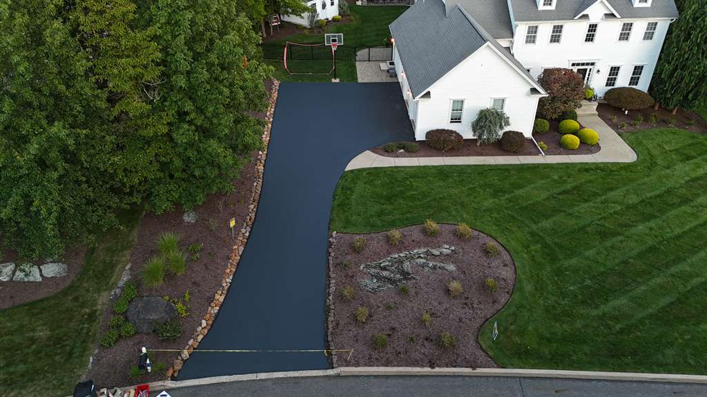 Shopping center parking lot sealcoating